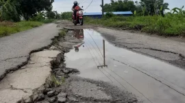 Ilustrasi jalan rusak 