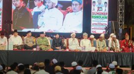 Foto : Dr. H. Achmad Fauzi Wongsojudo, S.H., M.H., dengan para tokoh ulama, Kepolisian dan TNI di atas panggung dalam acara bersalawat di bulan Ramadhan 2026. Dok. RADAR9.ID/Istimewa 